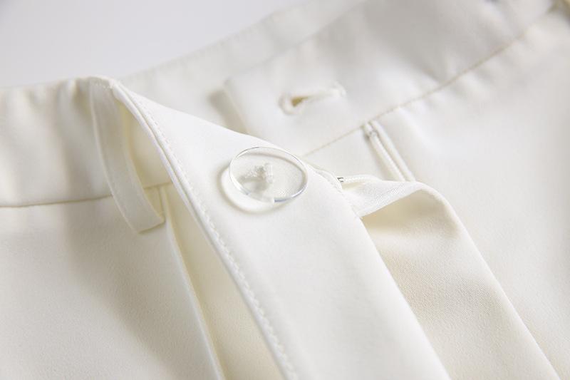 Up close pant closure detail on the Calista White Two Piece Set 