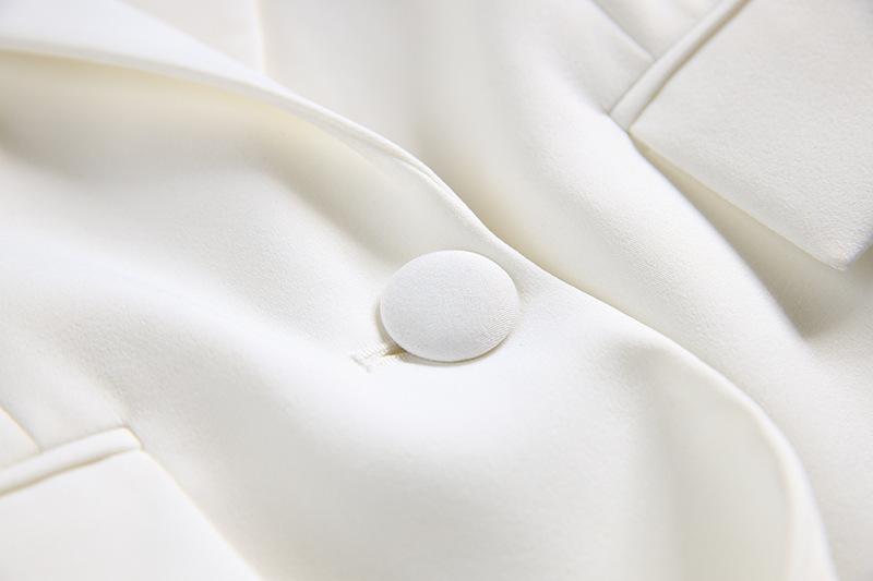 Up close button detail on the Calista White Two Piece Set Now - Women's Stylish Fashion at www.shopallara.com