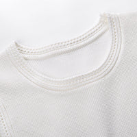 Celestia Sleeveless White Knit Midi Dress with Tassel Hem