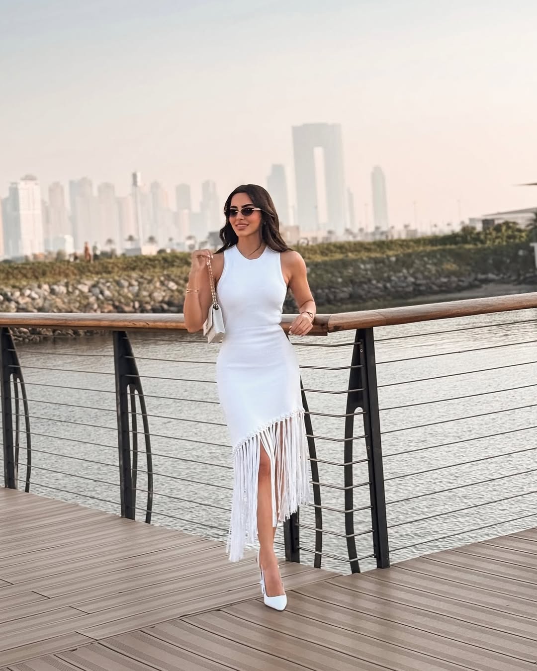 Celestia Sleeveless White Knit Midi Dress with Tassel Hem